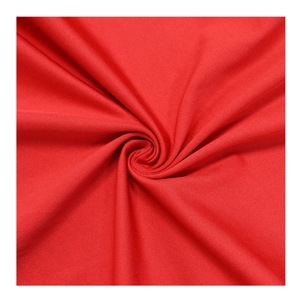 Macro shot of red ribbed knit fabric texture showing softness and material details