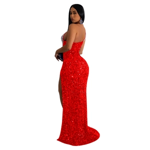 Detail of red sequin maxi dress featuring spaghetti straps and high slit for formal events
