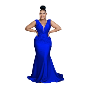 Detail view of the V-neckline and elegant waist pleats on this royal blue evening dress
