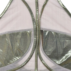 Detailed close-up of pink mesh and gold metallic coating texture on sleeveless dress