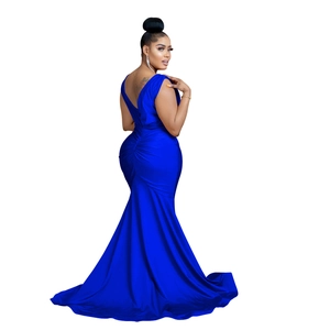 Detailed view of royal blue mermaid evening gown with deep V-neck and satin fishtail train