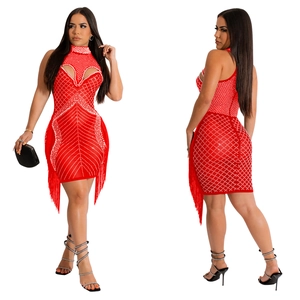 Detail of red sleeveless bandage dress with mesh rhinestones and long fringe hem