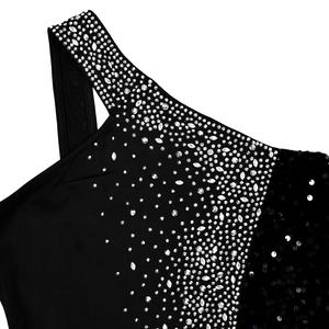 Detail of silver rhinestones and black sequins on a one-shoulder black evening dress