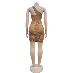 Detail view of the ruched back design and single shoulder cut on a brown mini dress