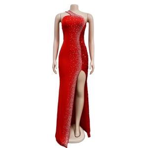 Detail of red one-shoulder evening gown with sparkling silver rhinestones and high slit