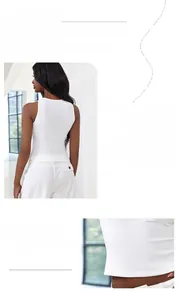 Detailed view of white ribbed knit tank top featuring a slim fit and breathable cotton fabric