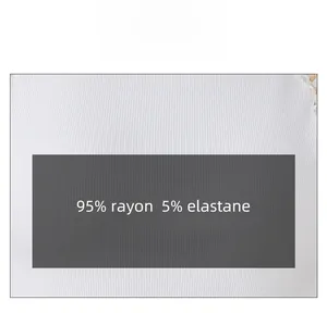 Macro detail of white ribbed fabric made of 95% rayon and 5% elastane texture