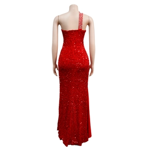 Detail of red sequin evening gown showing one-shoulder design with sparkling rhinestones