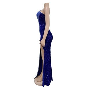 Detail of royal blue sequined gown with silver rhinestones and high slit side view