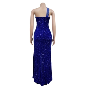 Detail of navy blue sequined evening gown with rhinestone accents on the shoulder