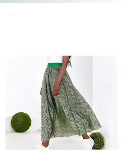 Macro detail of high-waist wide-leg skirt pants with leopard print and elastic waistband