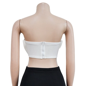 Detail view of the back white tube top featuring a functional zipper closure and neat stitching