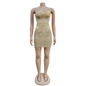 Detailed view of rhinestone mesh mini dress with gold beads and spaghetti straps