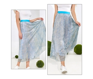 Detailed macro view of high-waist pleated gold foil mesh skirt in light blue color