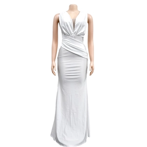 Detail of elegant V-neckline and horizontal pleated waist on a white mermaid maxi dress