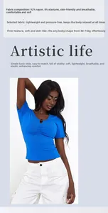 Detail of royal blue crop top showing 92% rayon fabric composition and V-neckline texture