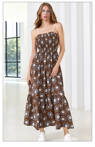 Close-up of bohemian floral print maxi dress with smocked bodice and tiered details