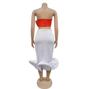 Back view of red tube top with metal zipper and white fishtail skirt set for women
