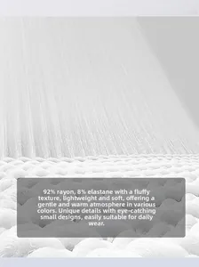 Macro texture of soft white fabric made of 92% rayon and 8% elastane for a slim T-shirt