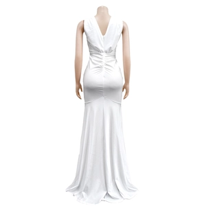 Close-up of white sleeveless fishtail dress with V-neck back and elegant ruching details