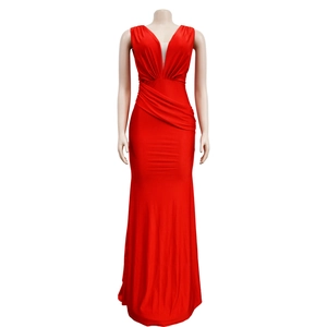 Detail of red V-neck evening gown showing pleated bodice and slim fit design