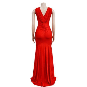 Detailed back view of red V-neck maxi dress featuring ruched waist and fishtail skirt