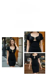 Detail eines schwarzen Bodycon-Kleides mit Brust-Cutout und grünem Stein-Ornament