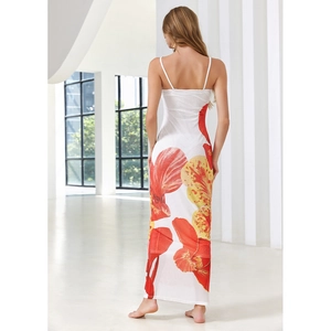 Robe d'été élégante dos nu blanche avec de grands imprimés botaniques rouges et jaunes