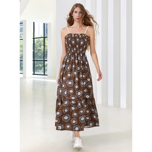 Brown floral maxi dress with backless design and sunflower print for summer holiday wear