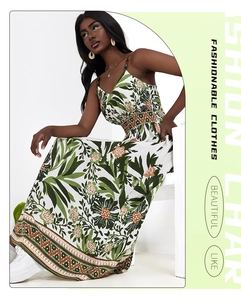 Detail of bohemian floral print and geometric texture on a halter summer maxi dress