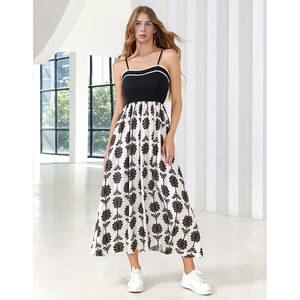 Elegant high-waist summer maxi dress with black bodice and white floral print skirt