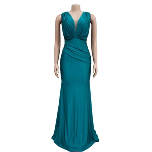 Detail of deep teal V-neck maxi dress with elegant pleats and shiny draped fabric