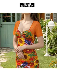 Detail of sunflower and US flag print on slim fit orange dress with heart neckline