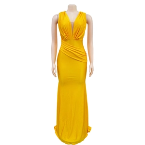 Detail of the plunging V-neckline and sunburst pleats on this bright yellow maxi dress