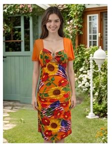 Detail of sweetheart neckline with gold ring ornament and mesh sleeves on floral dress