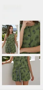 Detail view of green paisley print sleeveless top and shorts with braided tassel drawstrings
