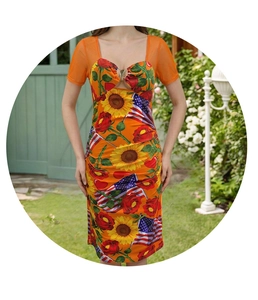 Detail of sweetheart neckline with gold hardware and mesh sleeves on floral flag dress