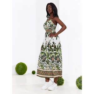 Women's summer floral maxi dress with tropical green leaf print and adjustable straps
