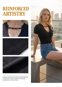 Detail of V-neck T-shirt showing colorful bead trim and reinforced stitching craftsmanship