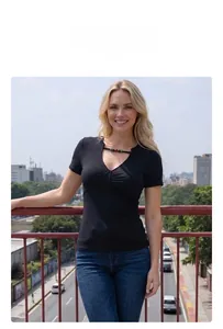 Detail of V-neck short sleeve top with colorful bead trim on the neckline and slim fit