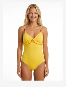 Detail of yellow one-piece swimsuit featuring ruffle trim and beaded shoulder straps