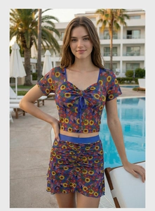 Detail of printed swimwear set featuring sunflower motifs and US flag patterns with drawstrings