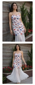 Detailed view of the gathered bodice with red blue and white nautical star shell patterns