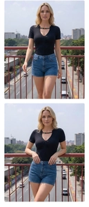 Detail of slim fit black V-neck T-shirt with lace-up beaded design and denim shorts