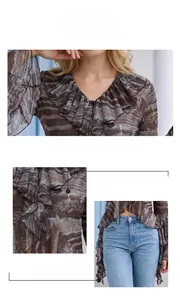 Detail view of V-neck lace trim and vintage elephant print on lightweight chiffon blouse