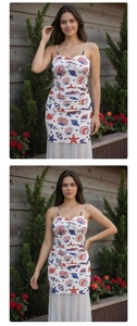 Detail of beaded spaghetti straps and ocean-themed flag print on a slim fit mini dress