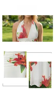 Close-up of halter neckline and vibrant red lily floral print on white maxi dress