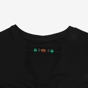 Black V-neck ribbed T-shirt with cutout neck detail and decorative skull beads