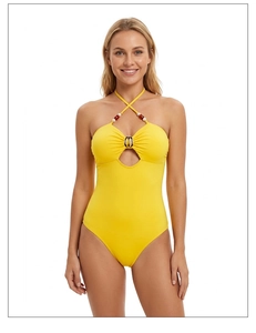 Detail of yellow halter neck swimsuit with pearl beaded straps and silver metal rings