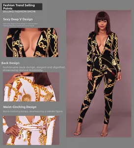 Detail of deep V-neckline and waist tie on long sleeve chain print jumpsuit